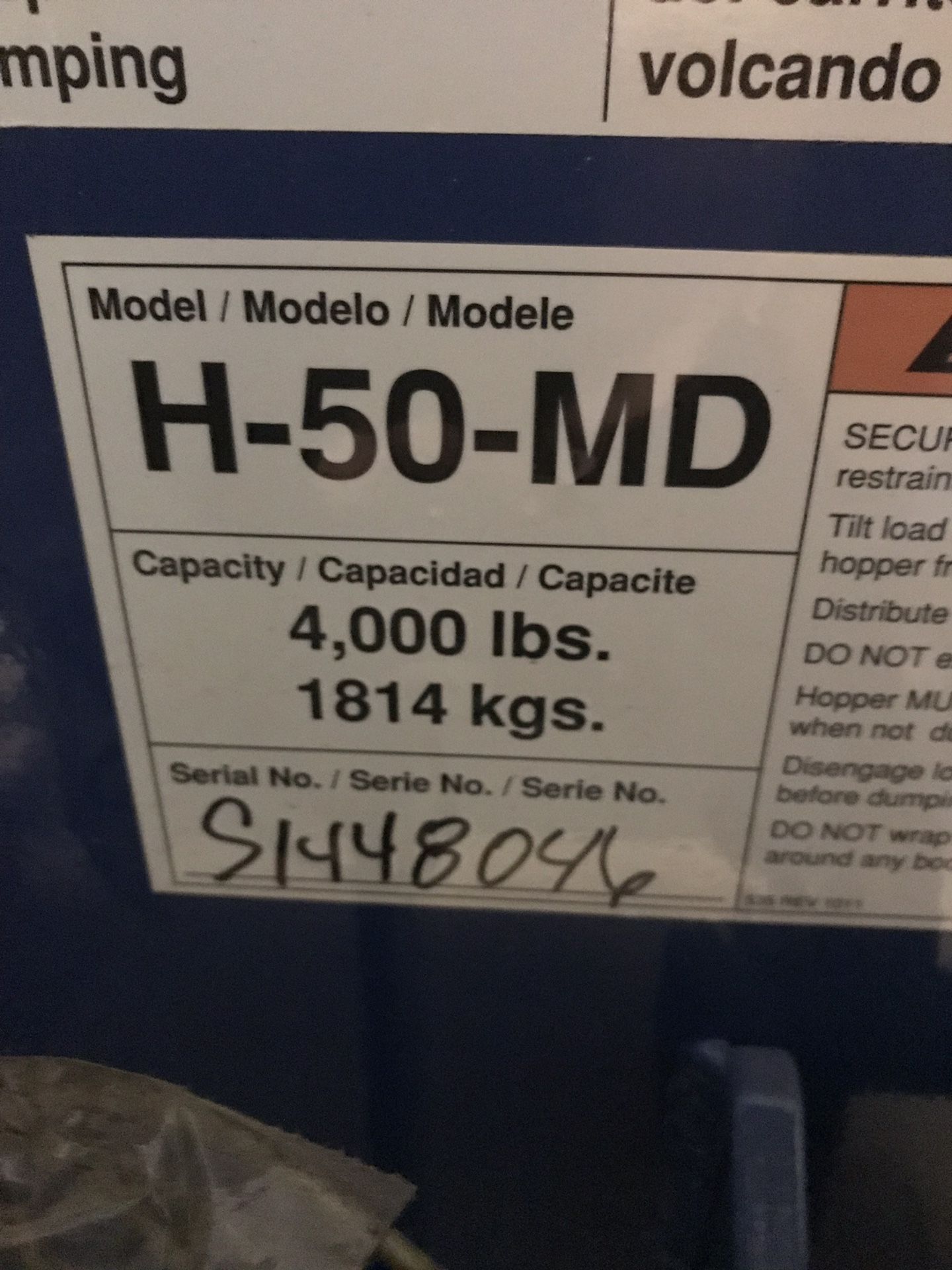 Self dumping forklift hopper