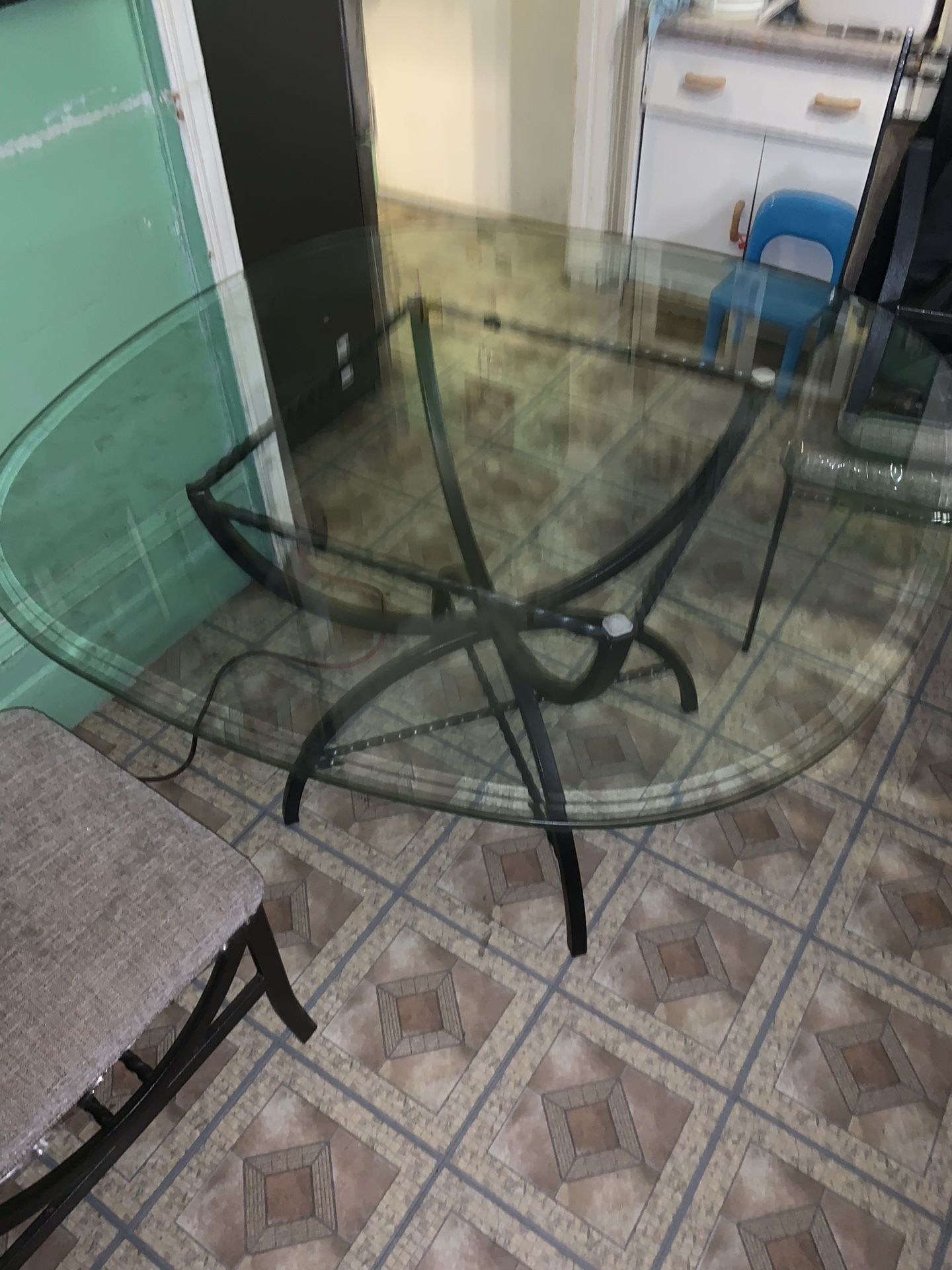 4 chairs plus glass Table