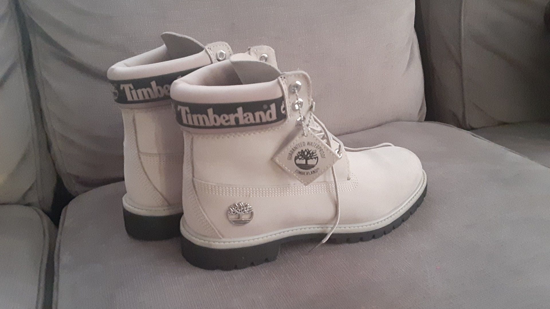 Size 9. Gray Timberland Boots Waterproof worn only 4 times. Need $100