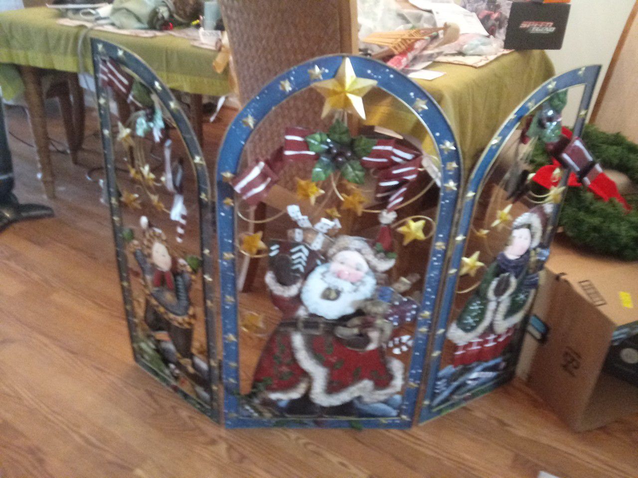 Metal christmas decor devided in 3 sections great for in front of fire place near tree or in patio 2 sides fold for standing or even wall 15.00