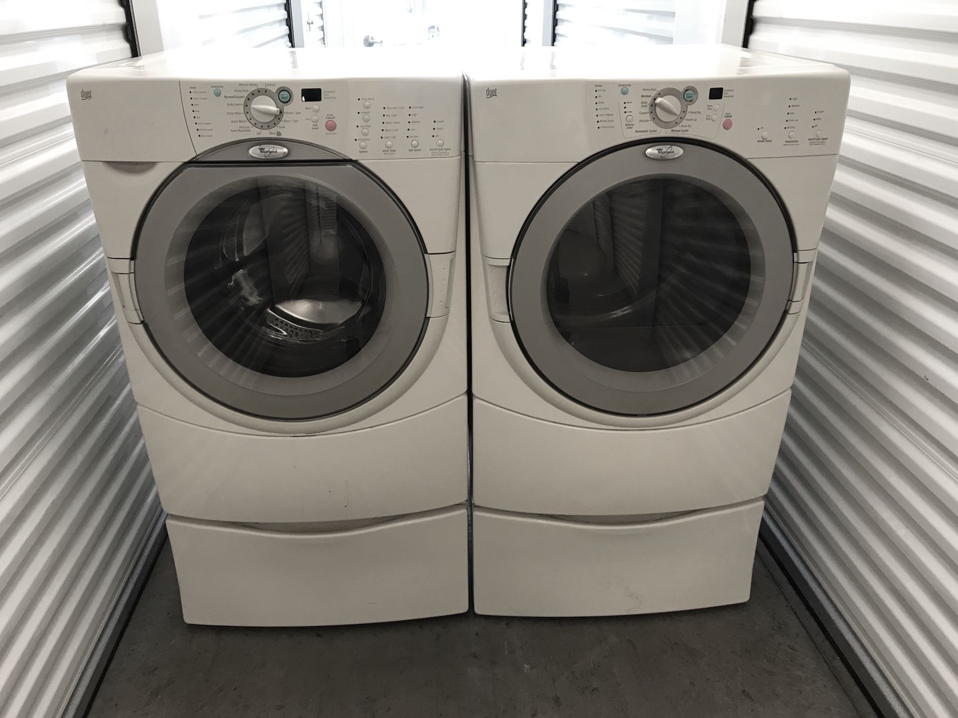 WHIRLPOOL DUET FRONT LOAD WASHER AND DRYER SET WITH PEDESTALS for Sale