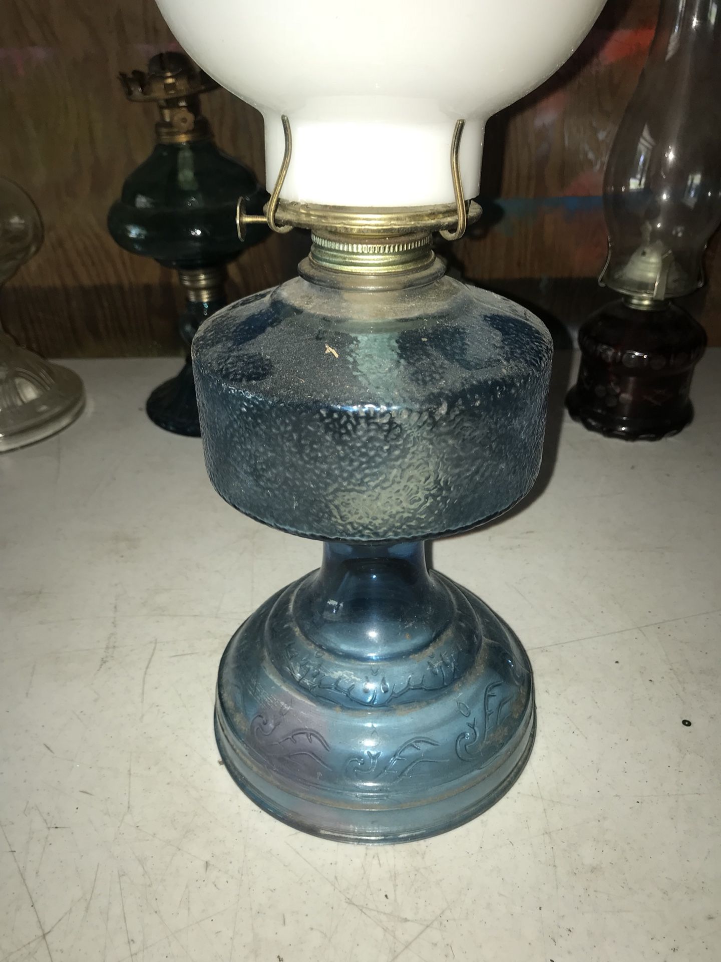 Large teal vintage hurricane lamp