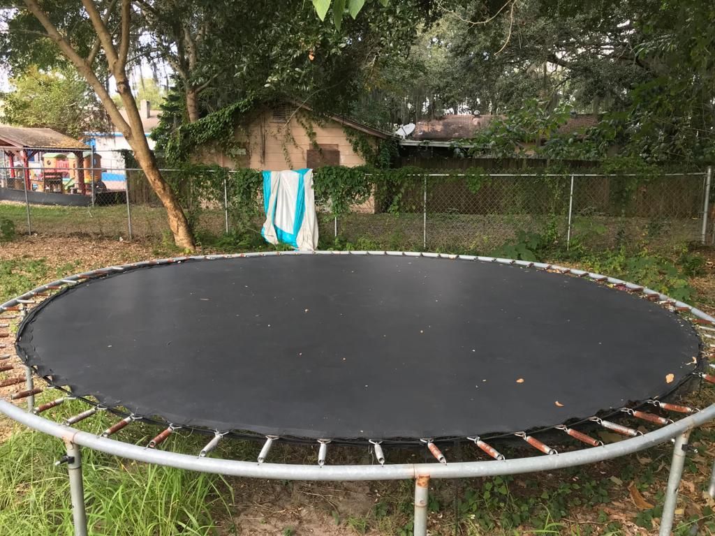 Trampoline And Basketball Hoop