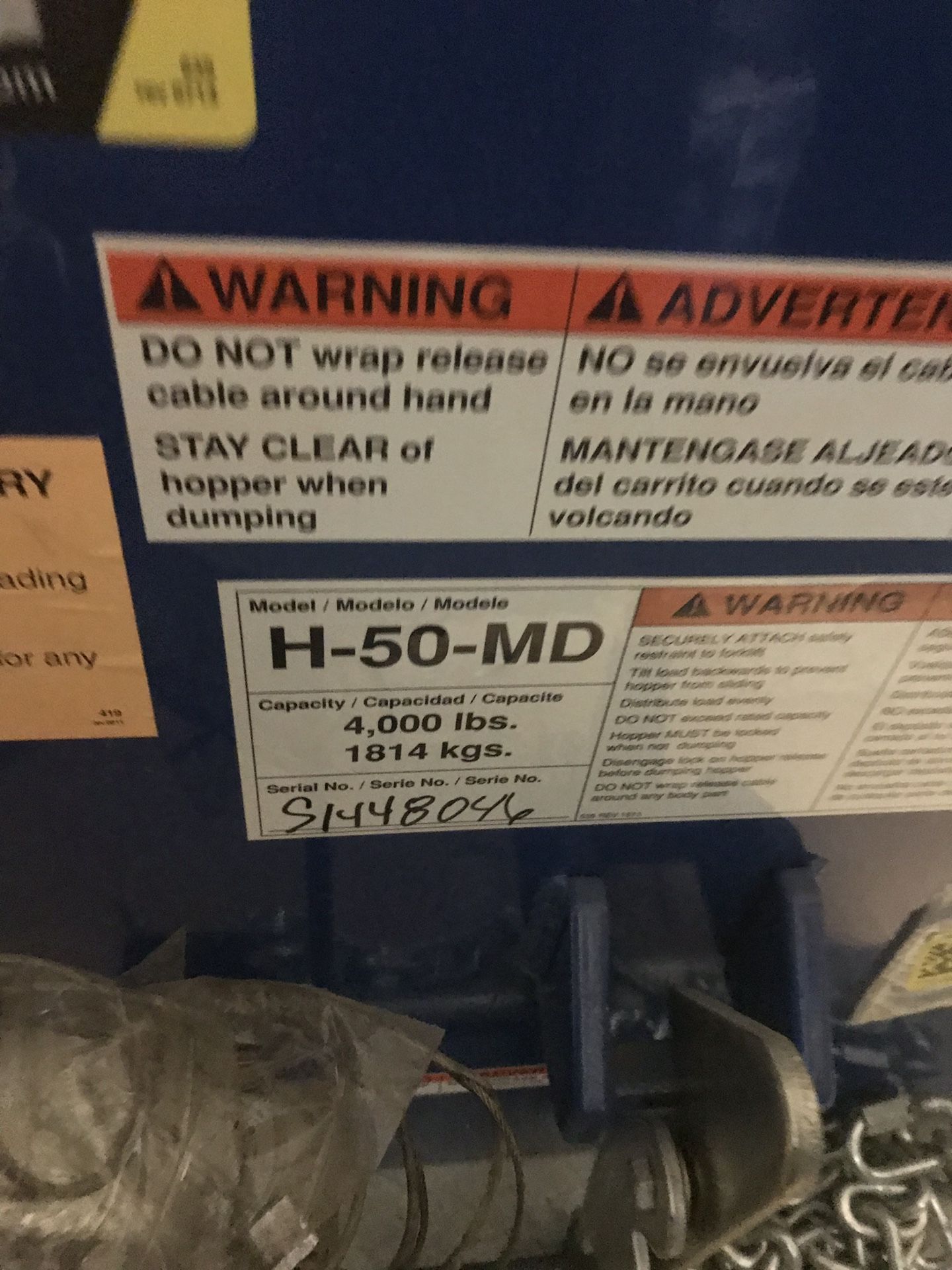 Self dumping forklift hopper