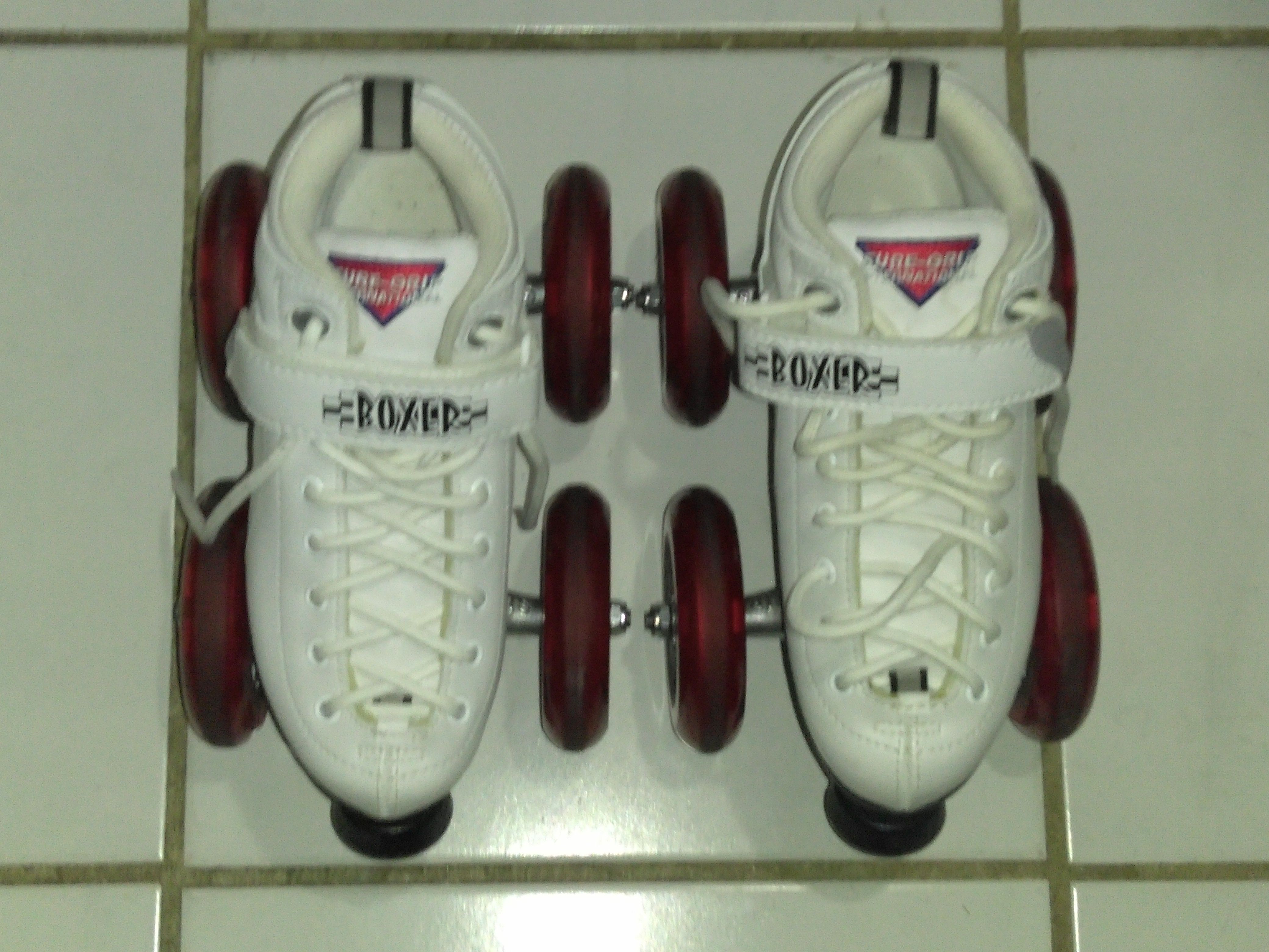 Size 4 Boxer skates with suregrip plates and oversized wheels
