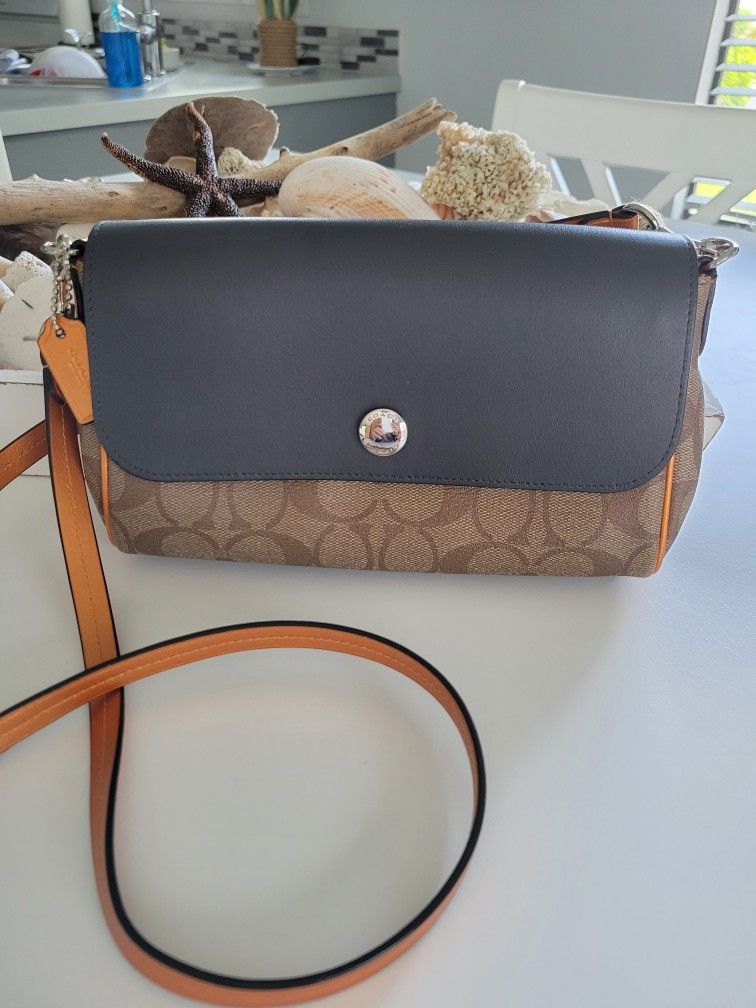 Coach Handbags, wallets And Wristlets