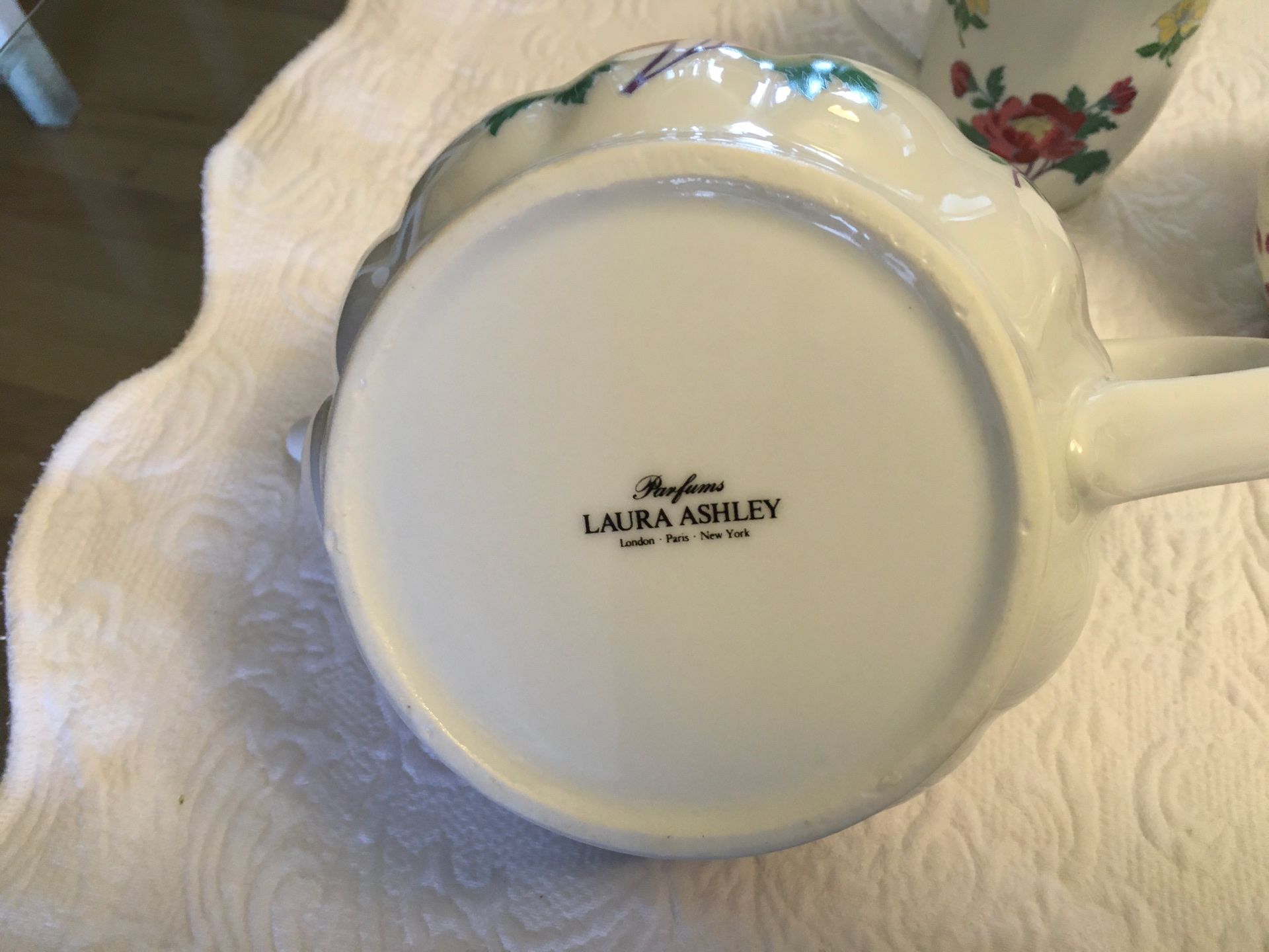 Laura Ashley China tea pot and assorted teacup and sauces ,and creamer