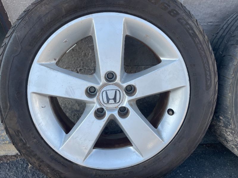 Honda 16 inch aluminum wheels. Fits Honda and Acura 5 on 4.5 - T02391
