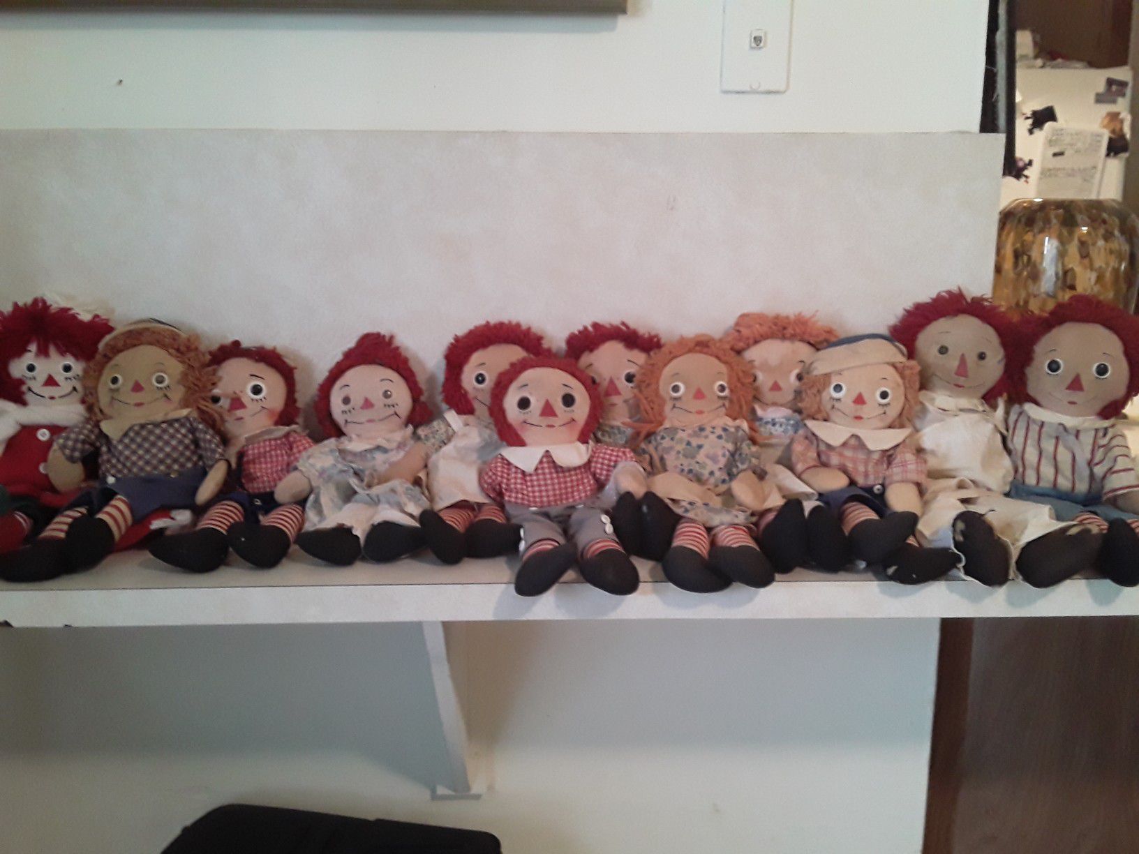 12 vintage Raggedy Ann and Andy Dolls