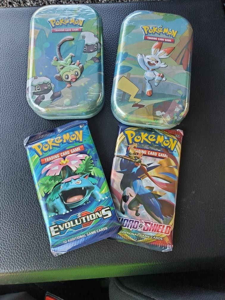 XY Evolutions Mini Tins Booster Pack $20