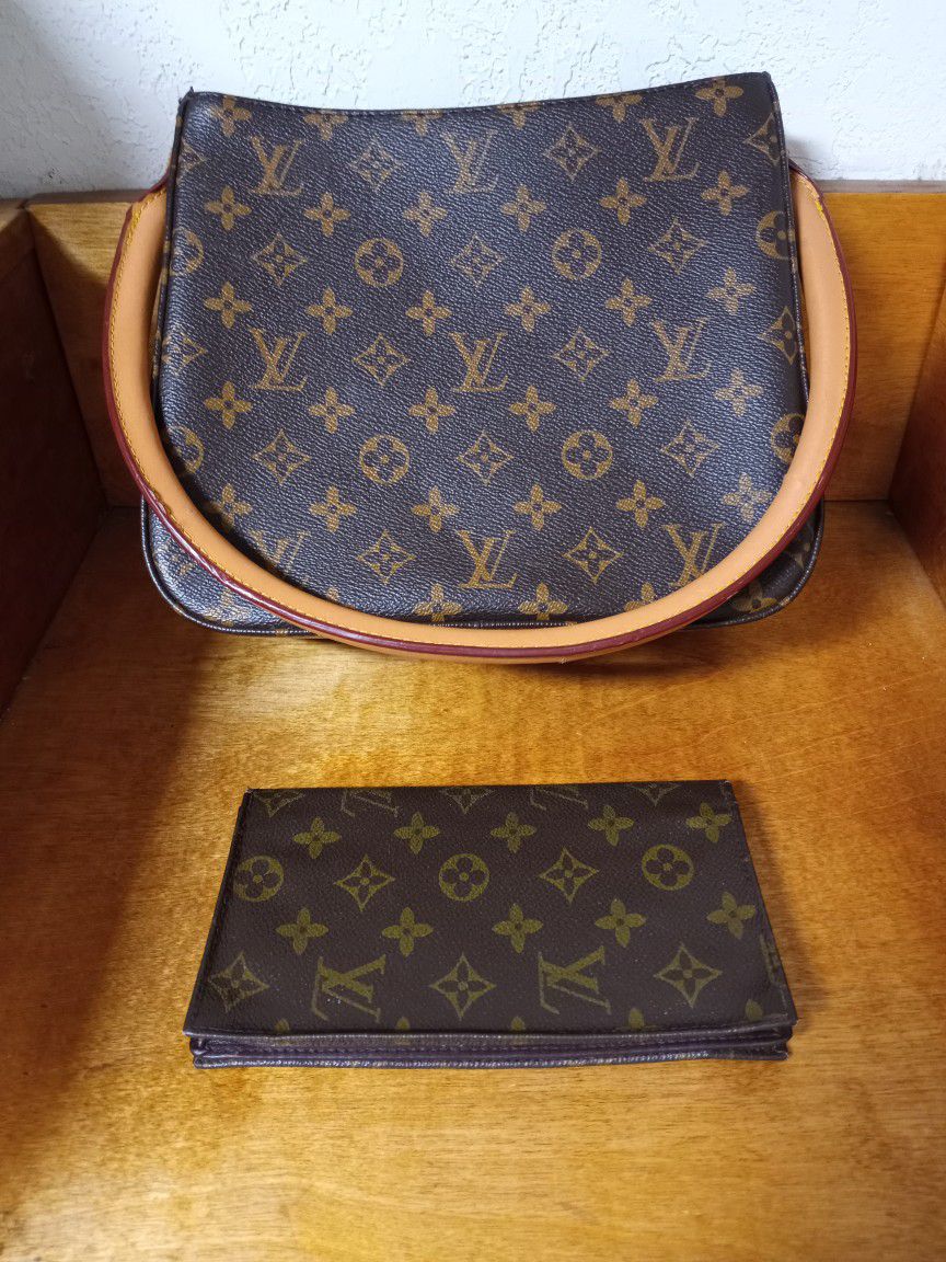 L.V. Handbag And Billfold