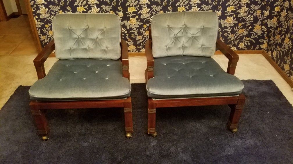 2 wooden velvet swivel chairs