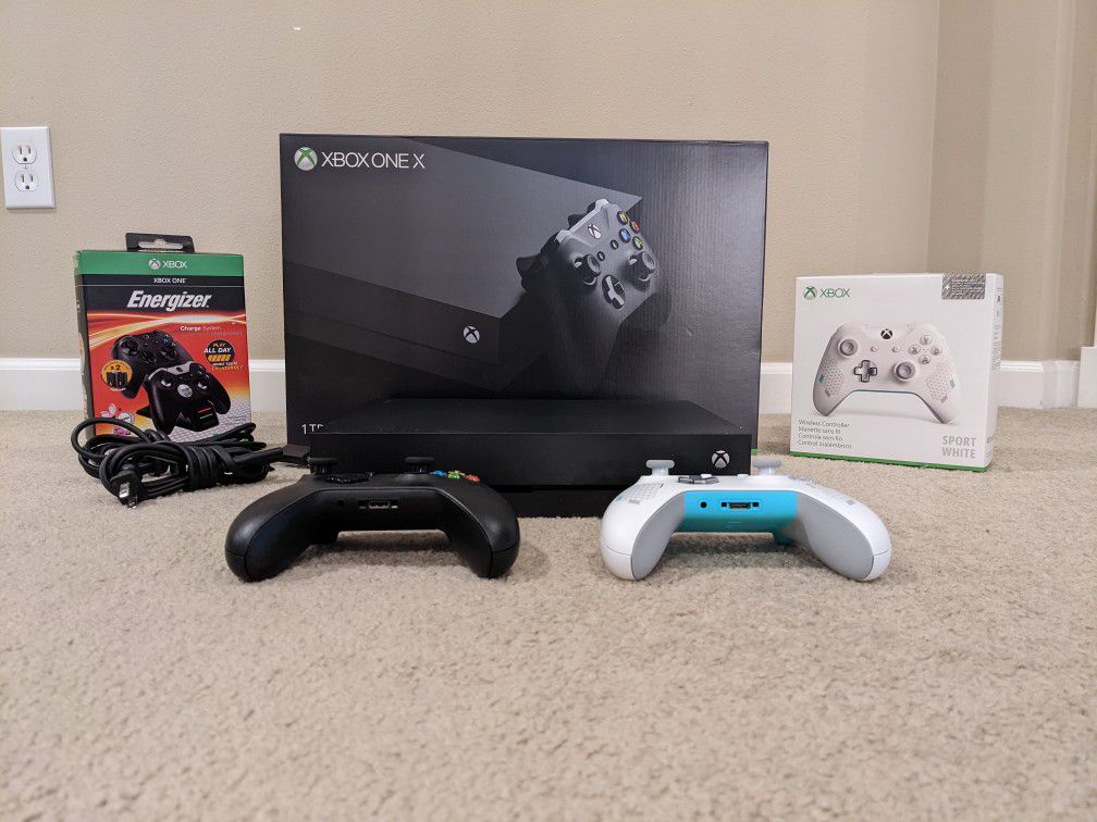Xbox One X with extra controller and charging system