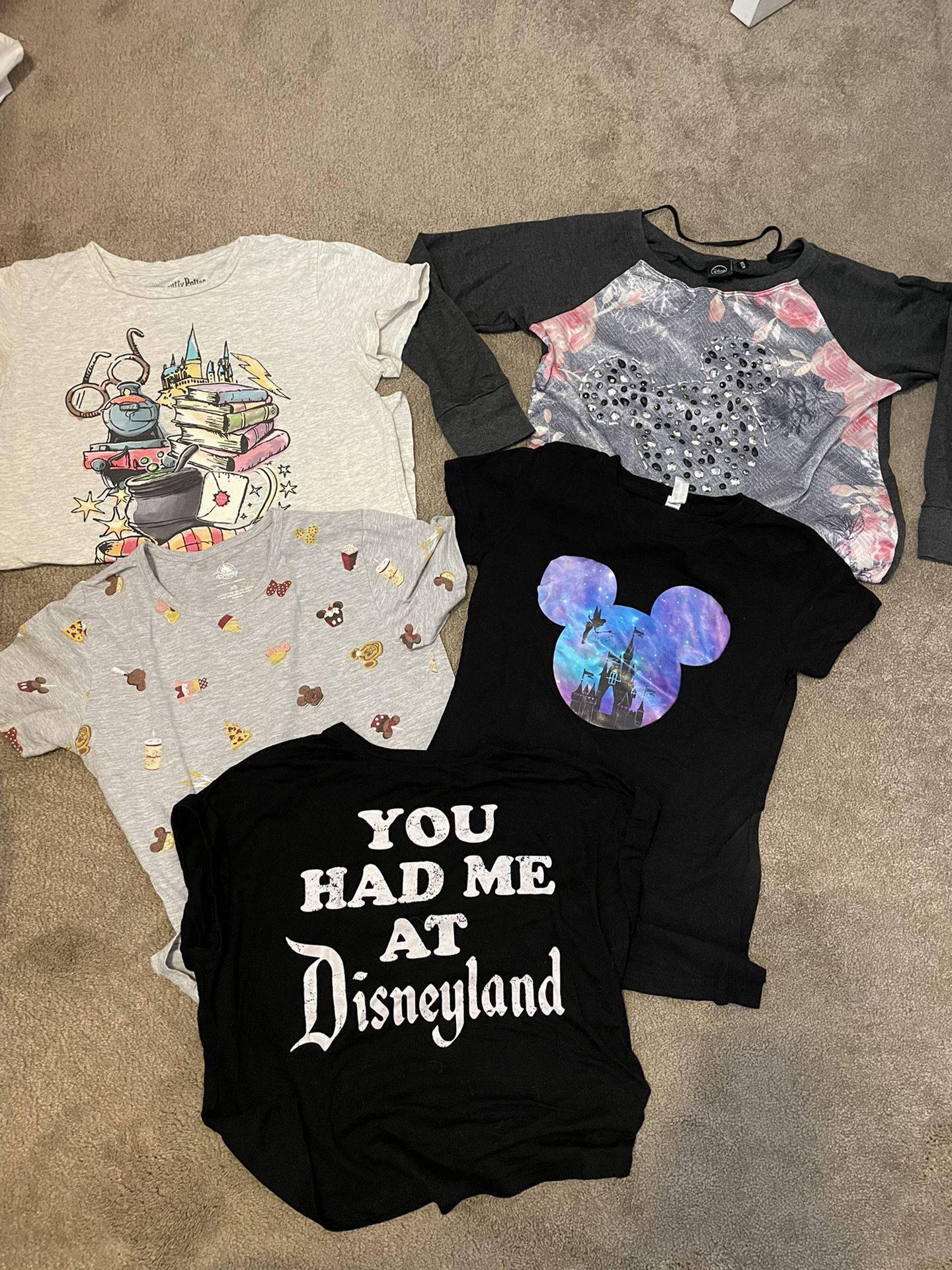 Five women’s Disney T-shirts