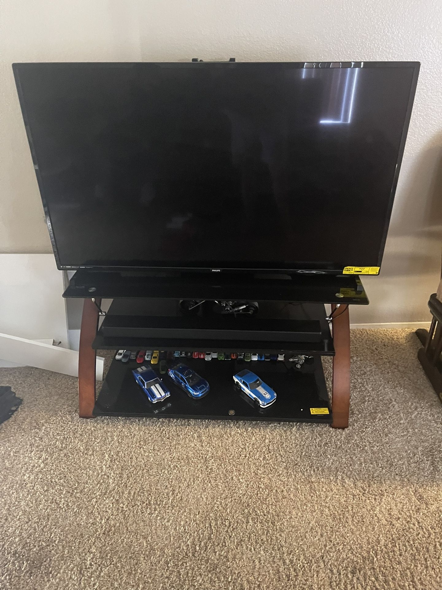 Combo TV stand with 55 inch Philips TV almost brand new