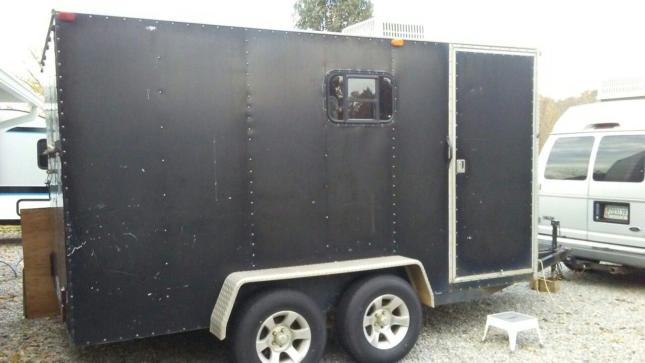 Toy hauler camper. Elite V Nose Cargo trailer camper. Self contained dual axle heavy duty 2" studs box. light weight 2900 lbs
