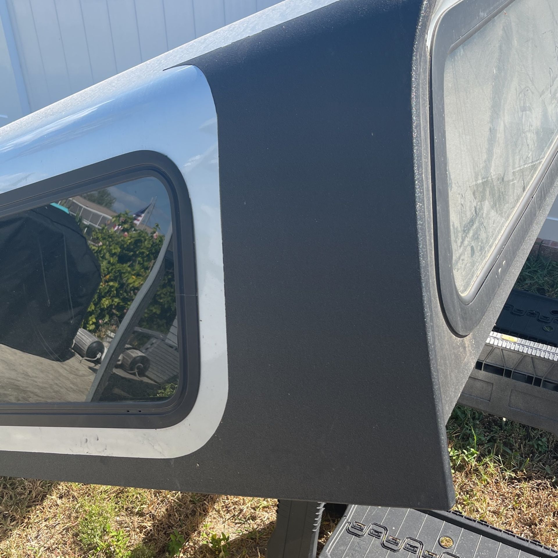 2016 silver Chevy Silverado Are Fiberglass topper