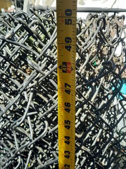 A Roll Of Black Vinyl Coated 4' Chainlink Fence Thumbnail