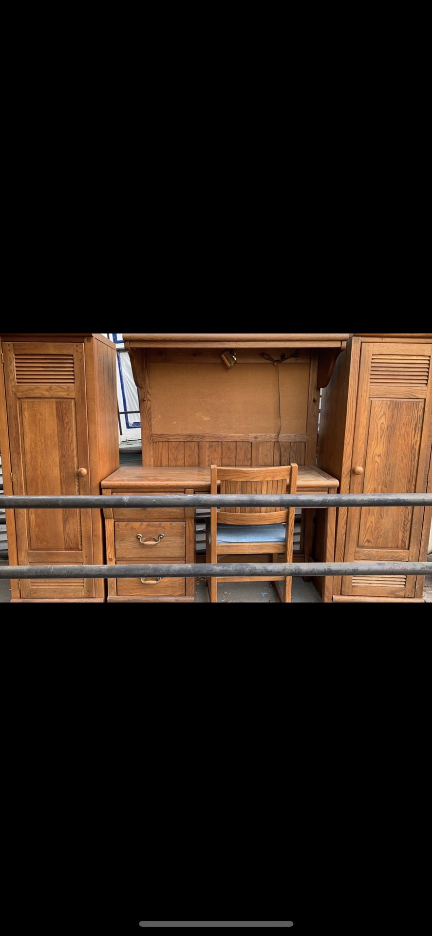 Very cute bedroom set. Twin headboard with overhead light and pegboard. Desk with chair. Two side lockers solid oak fits in a small bedroom nicely.