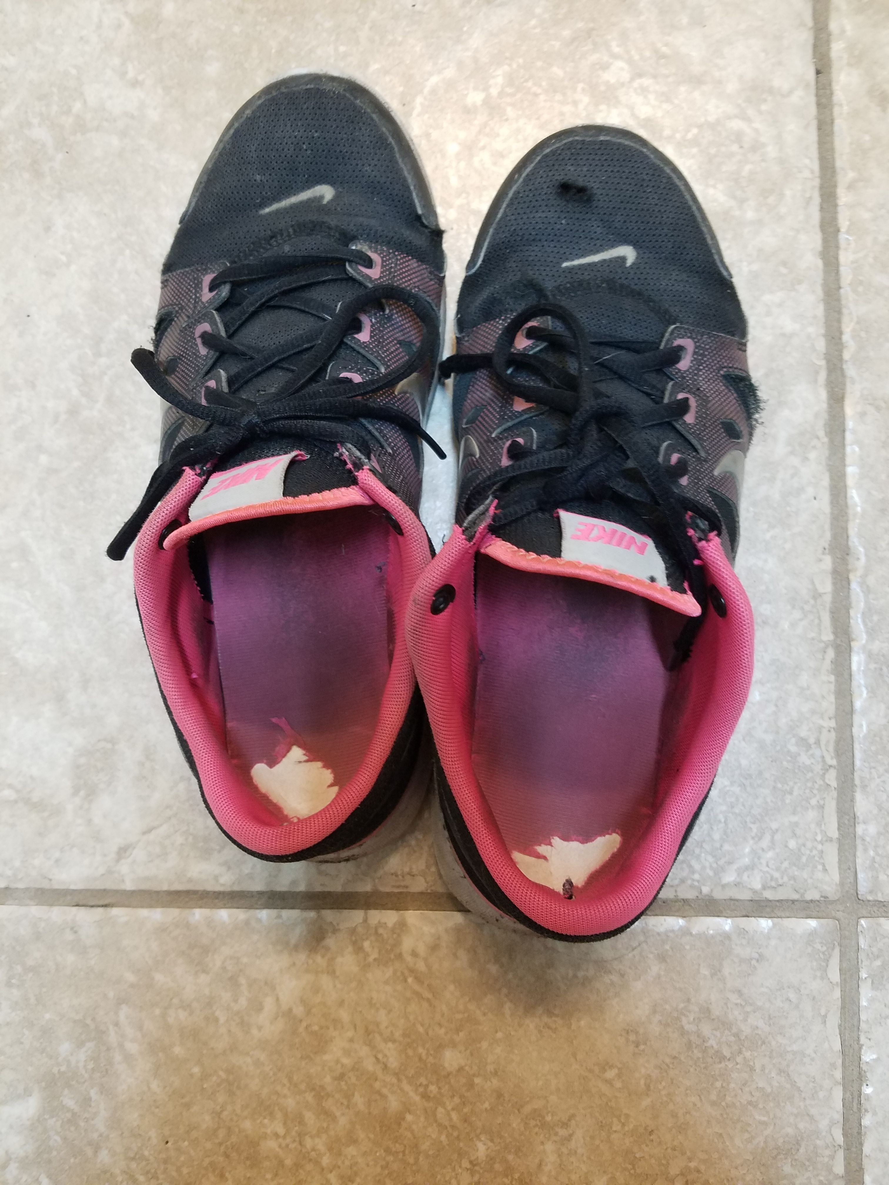 well worn trashed shoes