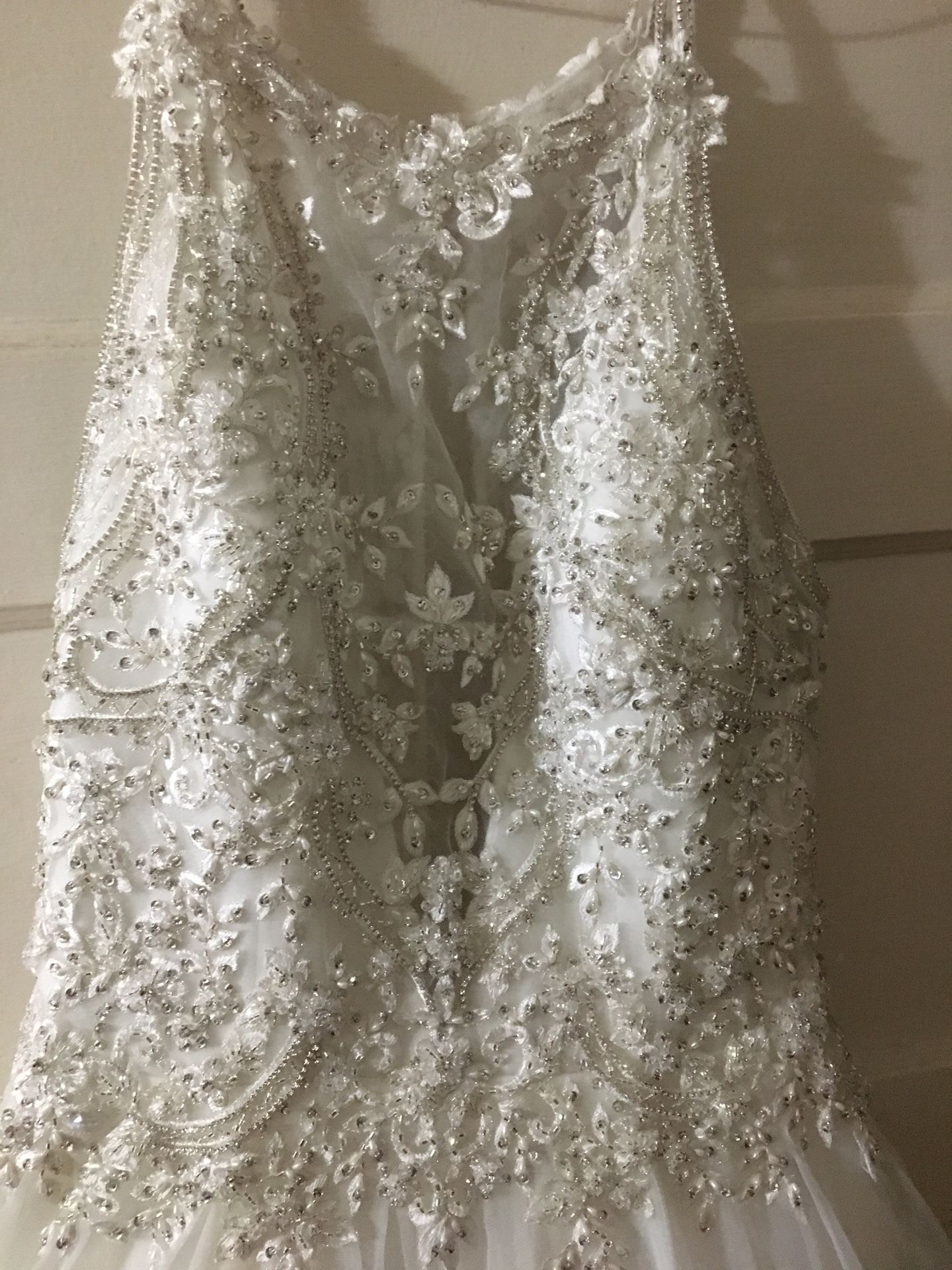 Size 8 Maggie sorrento wedding dress. Gold/ivory. Sweetheart neckline. Long train. Used in mint condition.