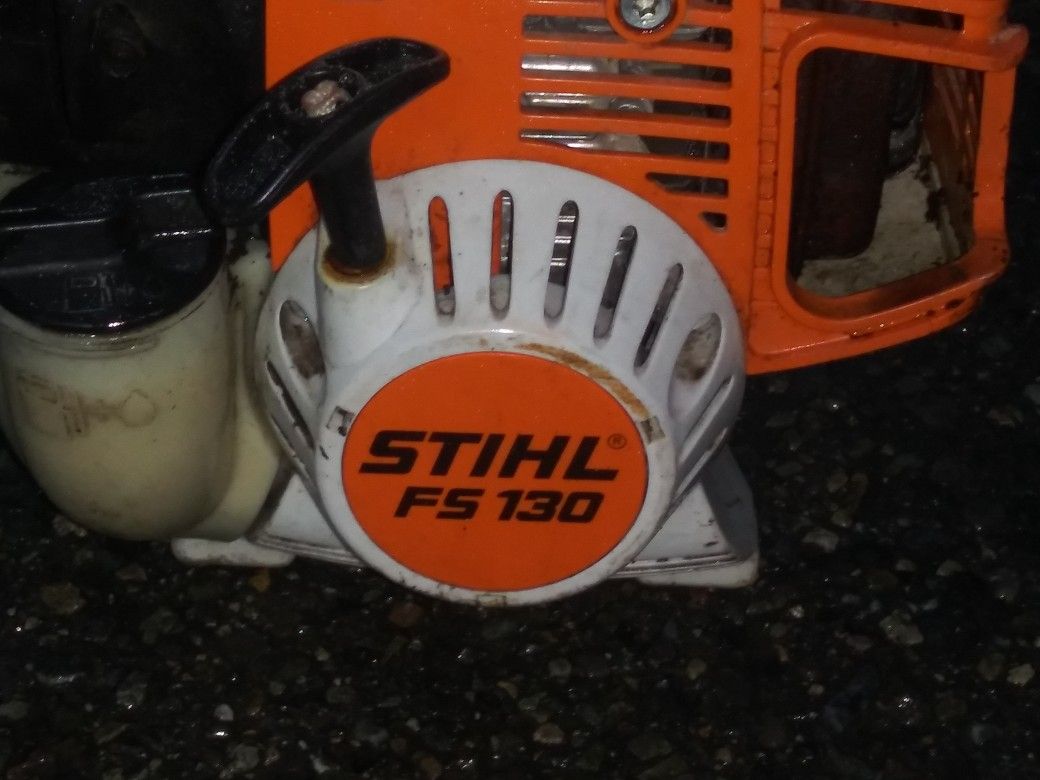 Stihl FS130 commercial weed eater, brush wacker interchangeable power