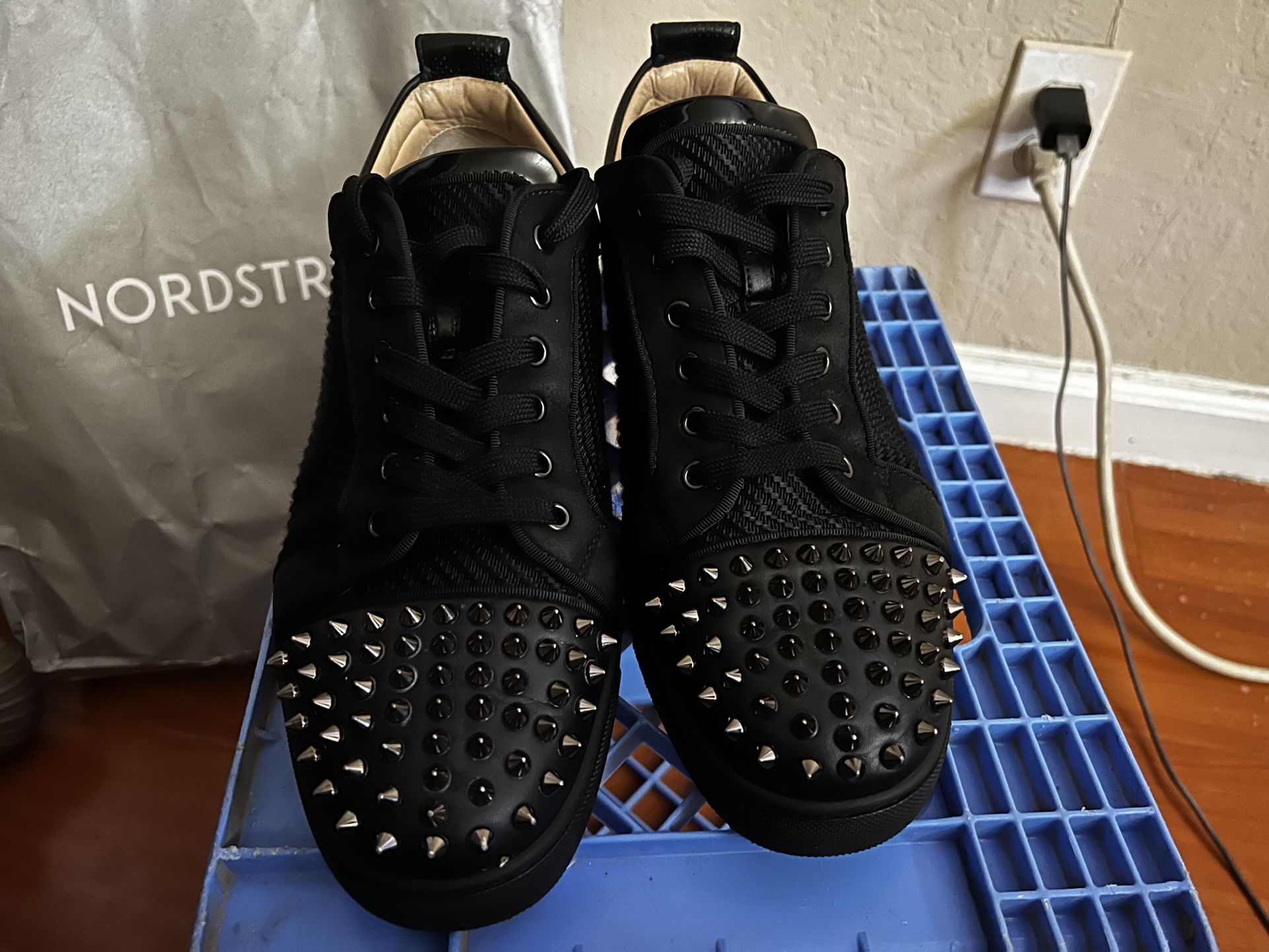Low top Christian Louboutin/Red bottoms