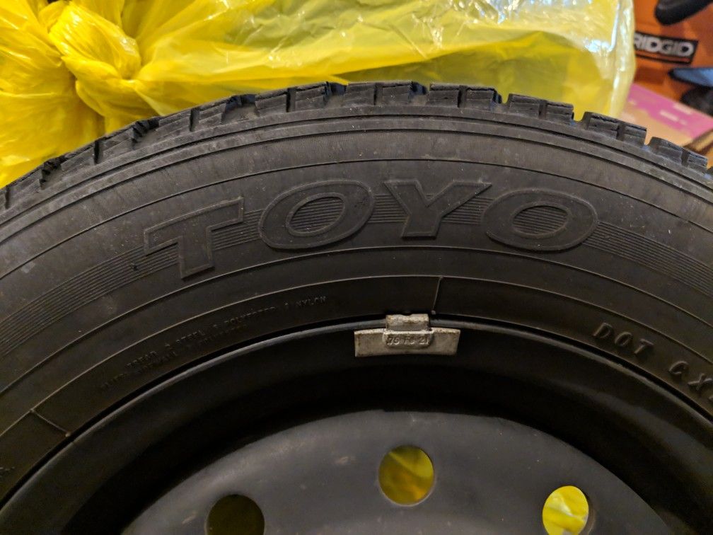 TOYO Observe G02 Snow Tires/Les Schwab 14" Wheels for Sale in Auburn
