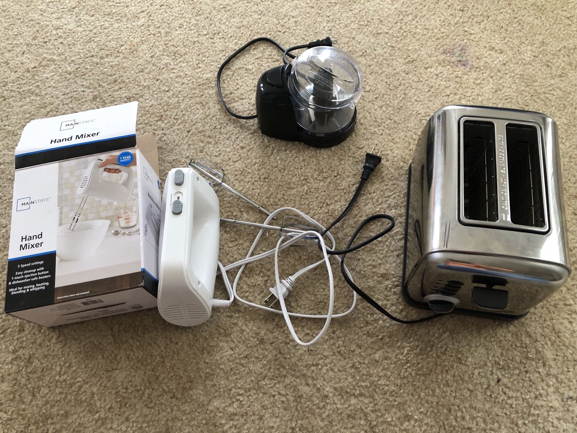 Bread toaster , hand mixer , vegetables chopper