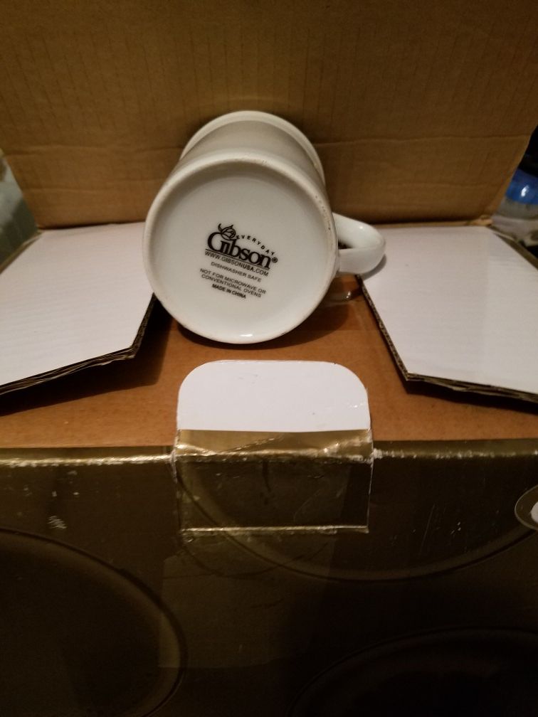 Gibson coffee cups.