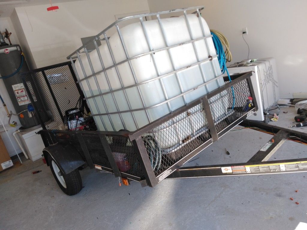 Black trailer with mobile detailing equipment