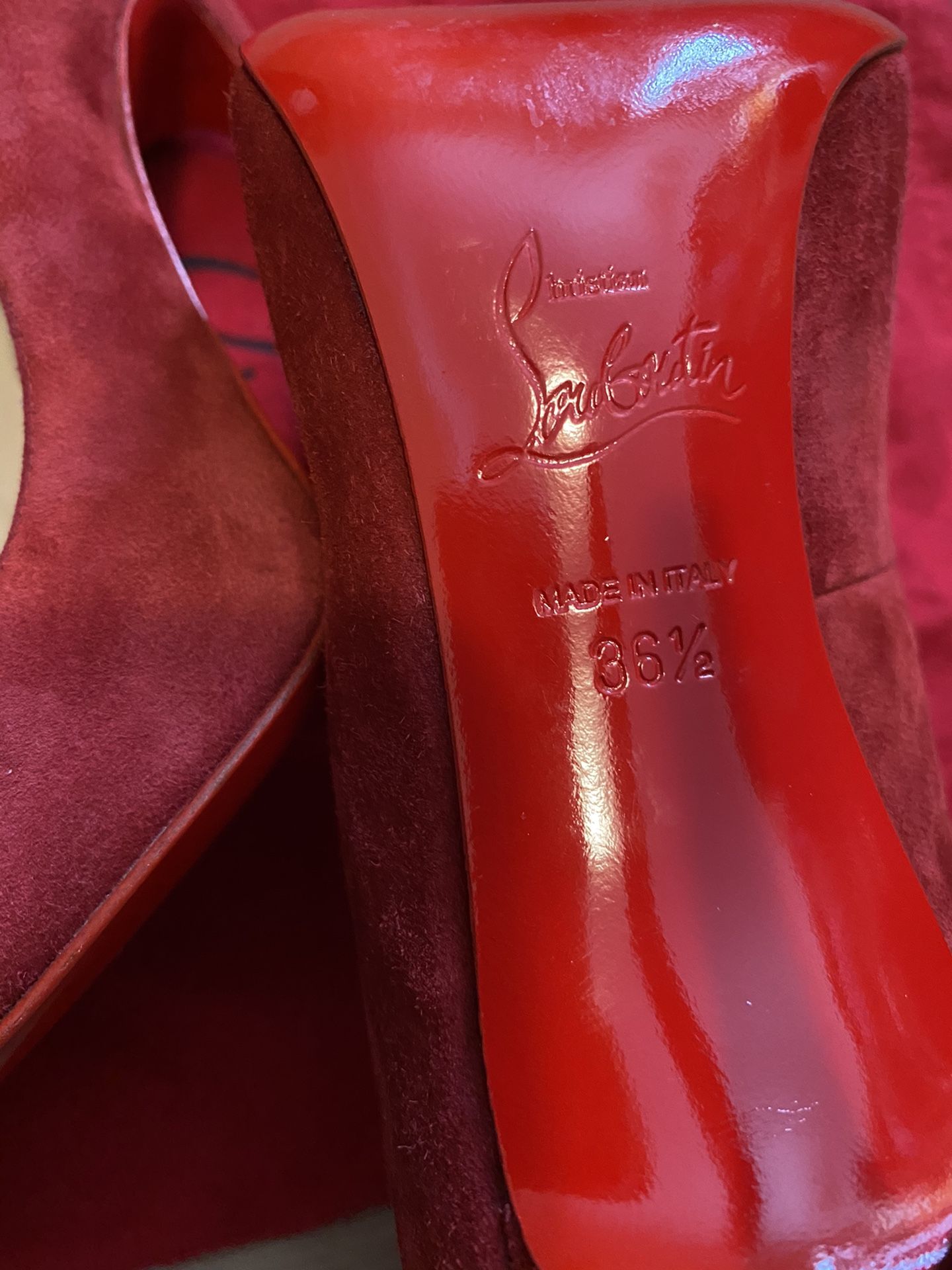 Christian Louboutin Size 36 1/2 burgundy color