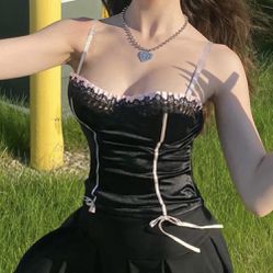 Corset Looking Black Top With Pink Bows At The Bottom Thumbnail