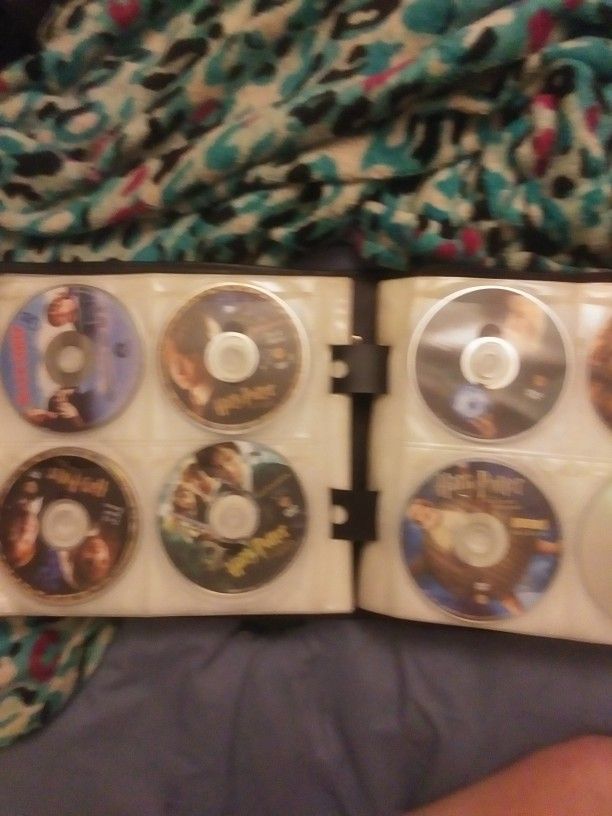 Binder With 200 Dvd/Blue Ray/Couple Games