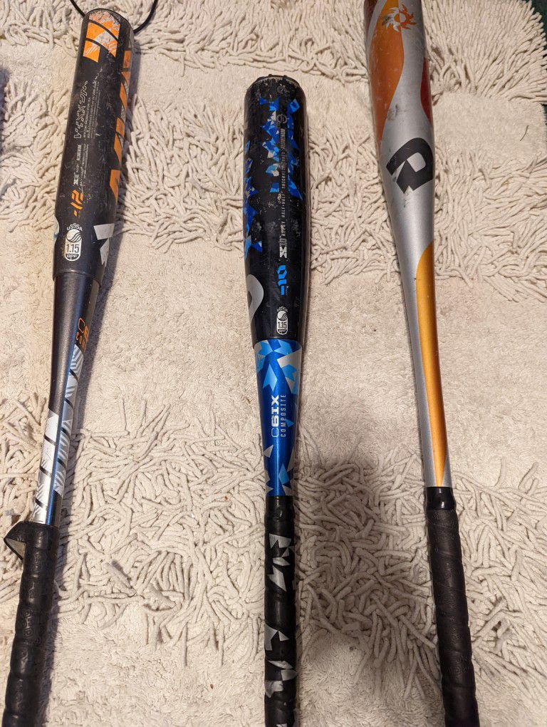 Lot of baseball bats