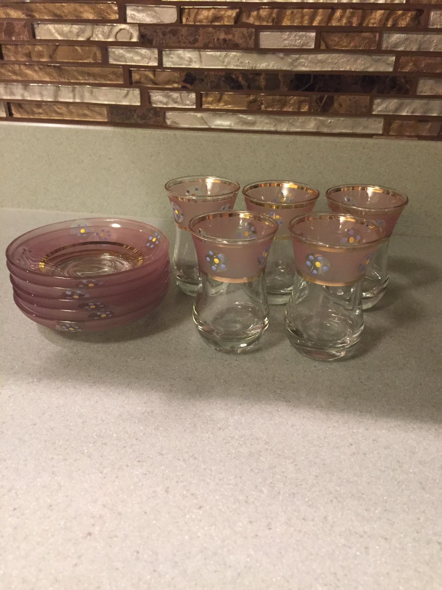 5 TEA CUPS WITH MATCHING PLATES
