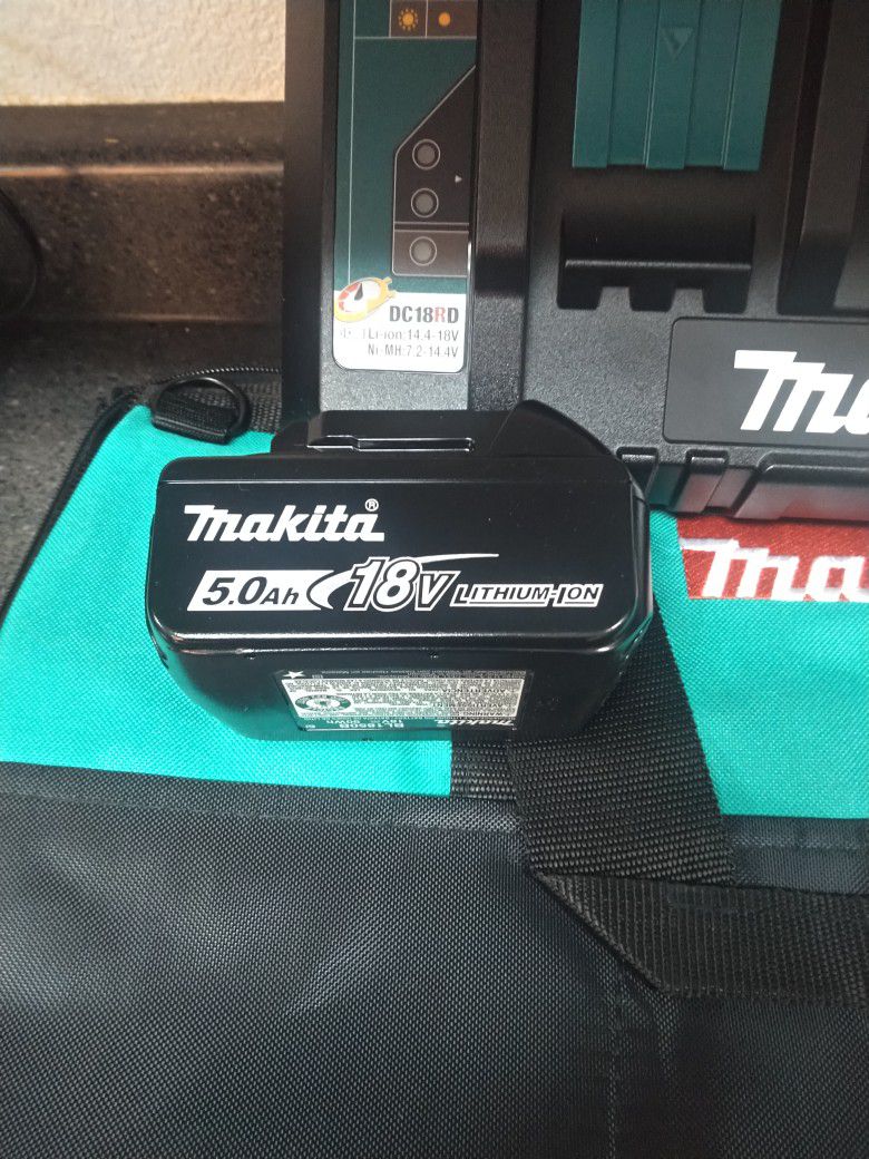Brand New Makita Dual Port Charger +2-5ah 18 Volt Batteries And Heavy Duty 22x11 Makita Contractor Bag $150 Firm