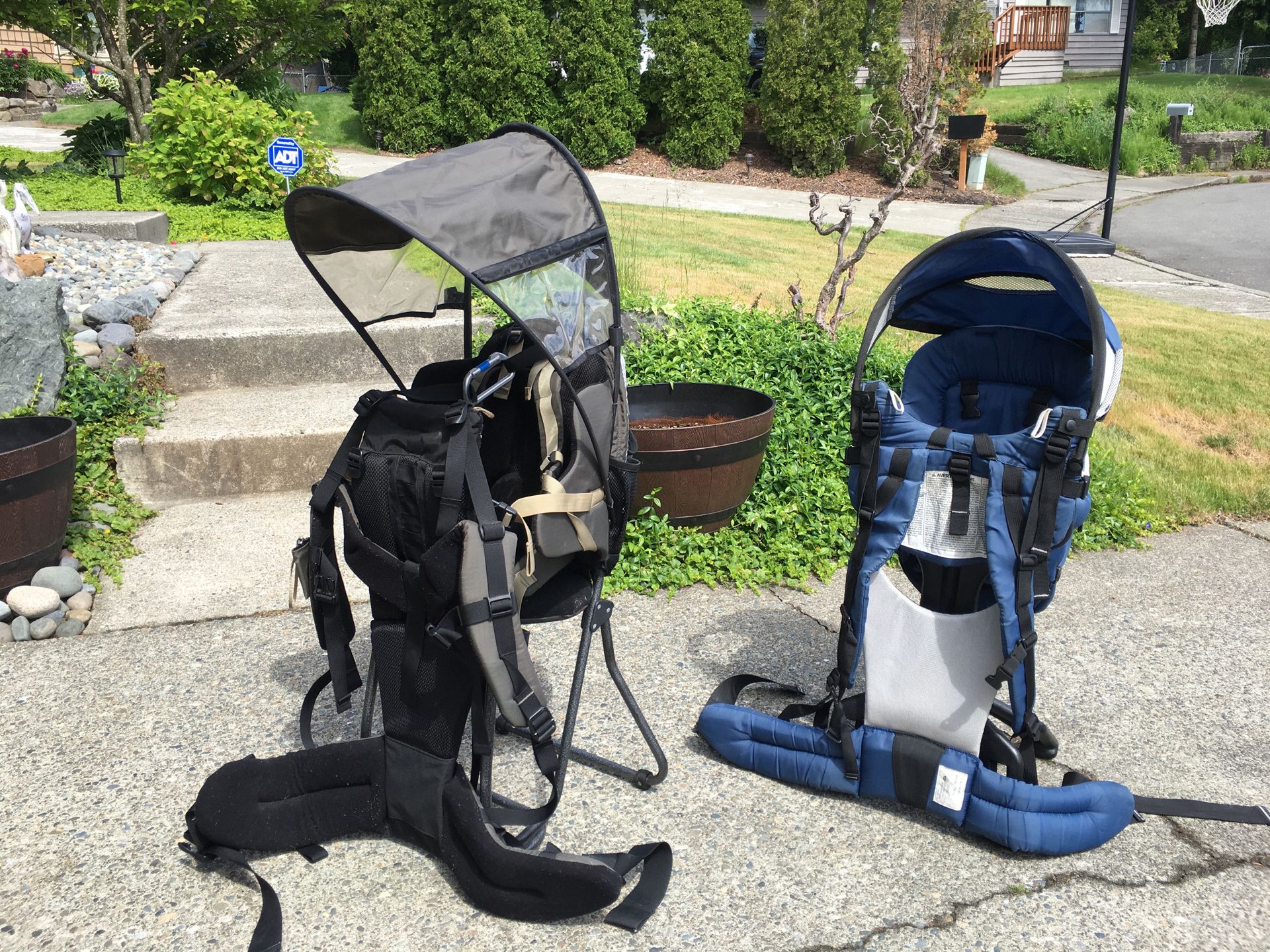 REI child carrier and Evenflo child carrier baby carrier with canopy