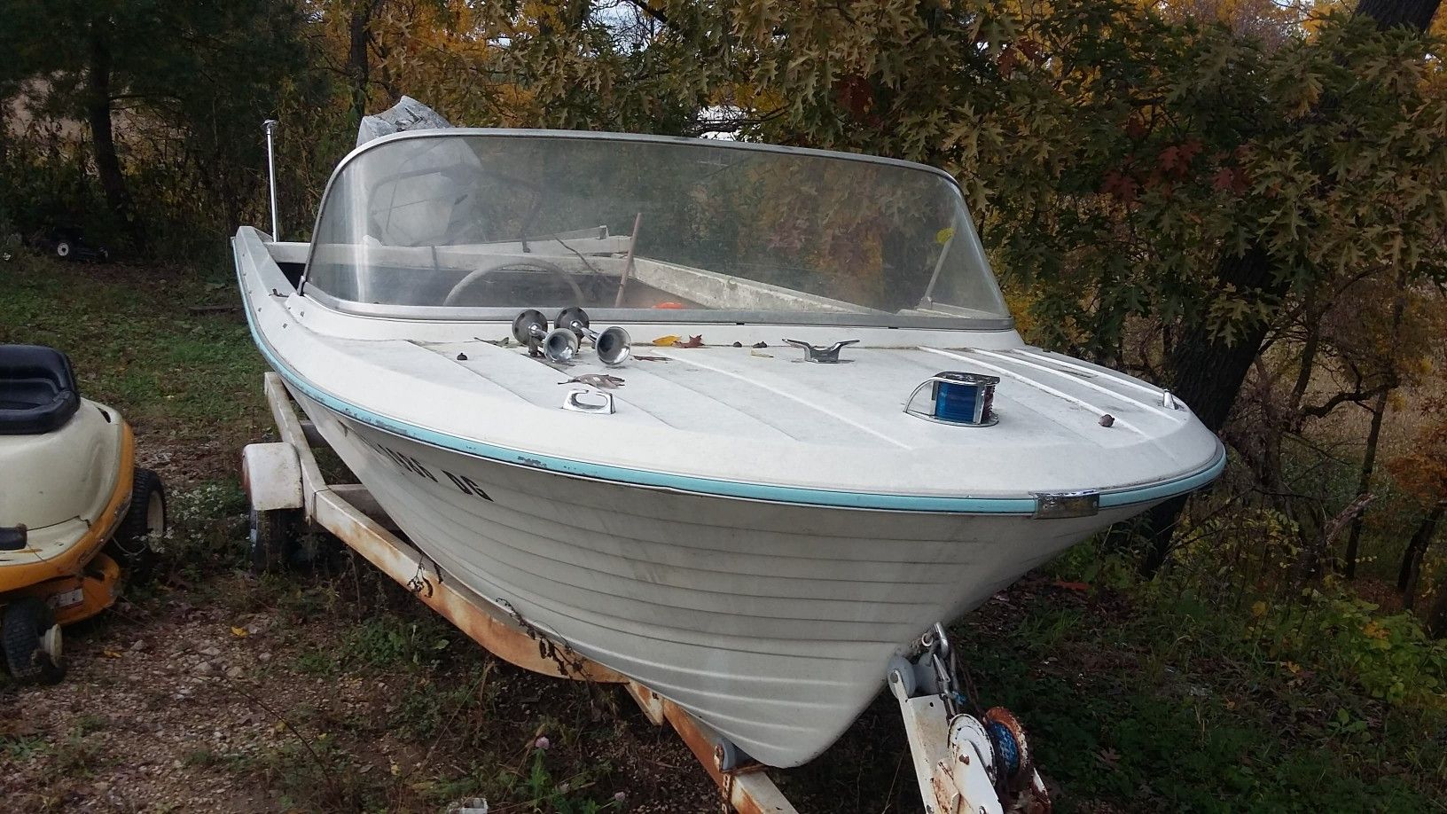 17 foot. 80 hp Sea King & trailer