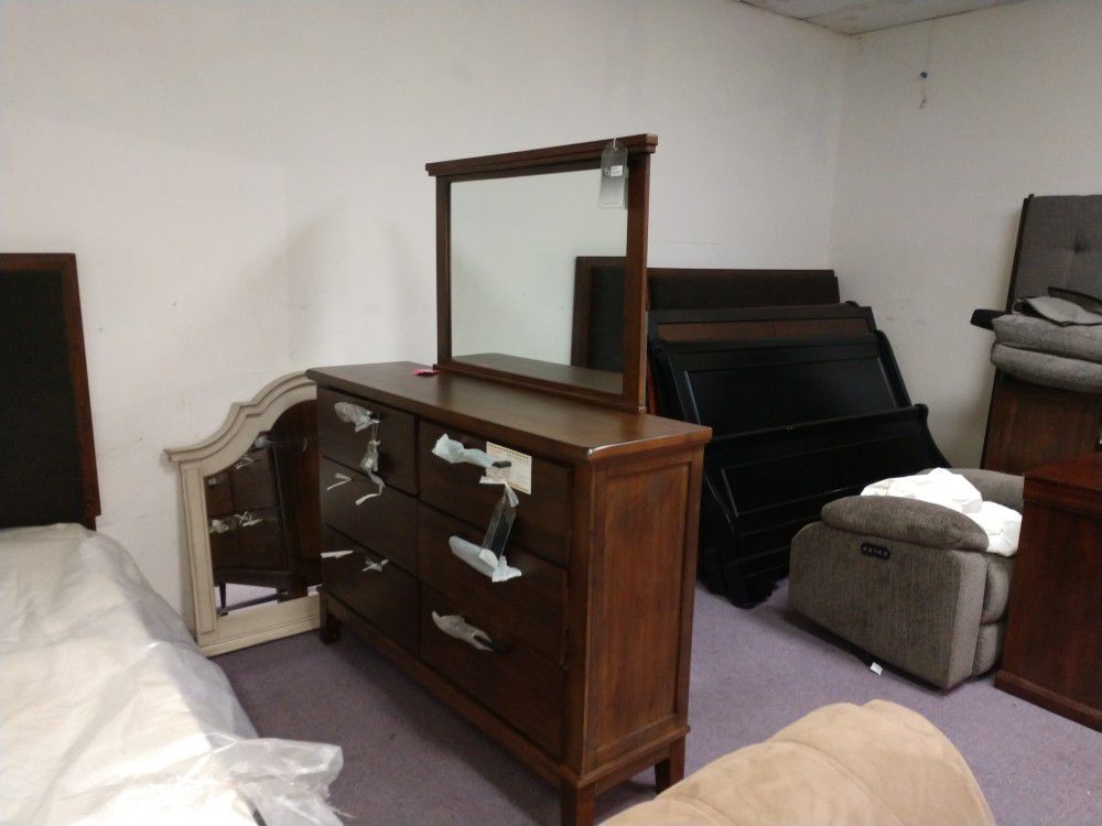 King bed with. Dresser and mirror