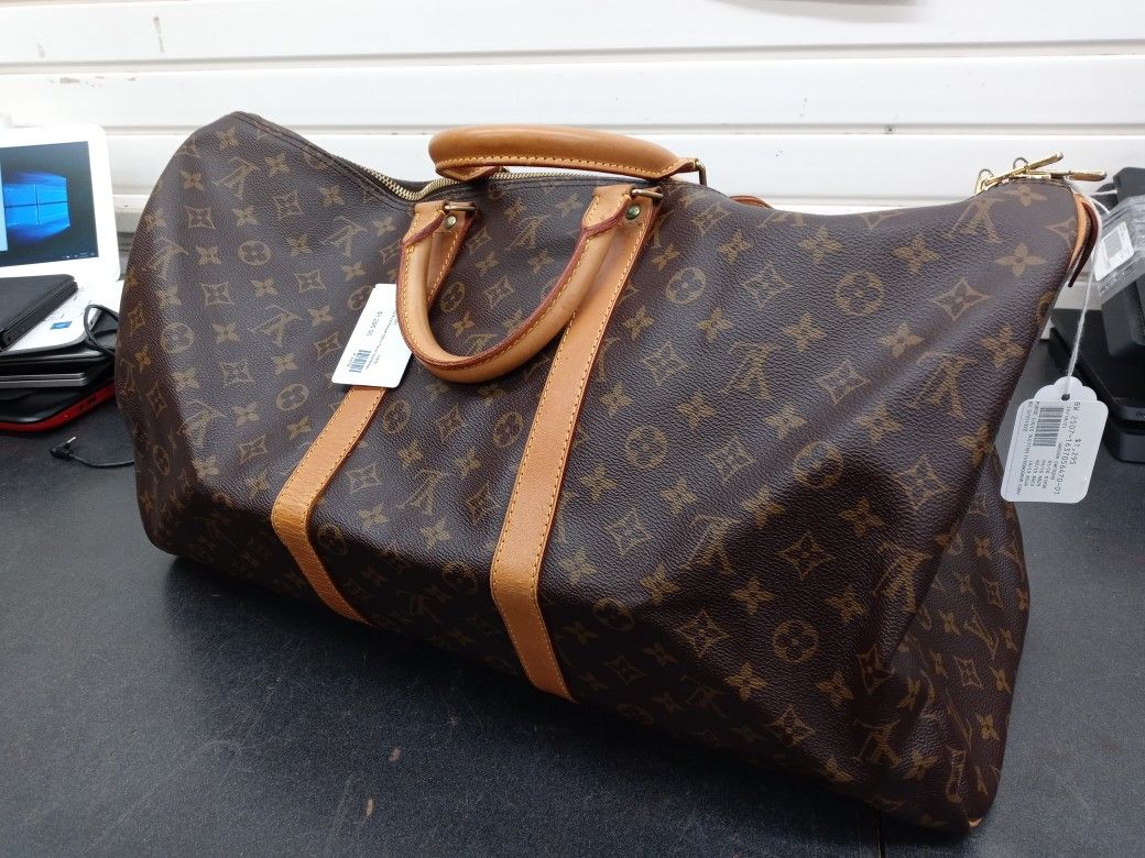 Louie Vuitton Duffle w/certificate