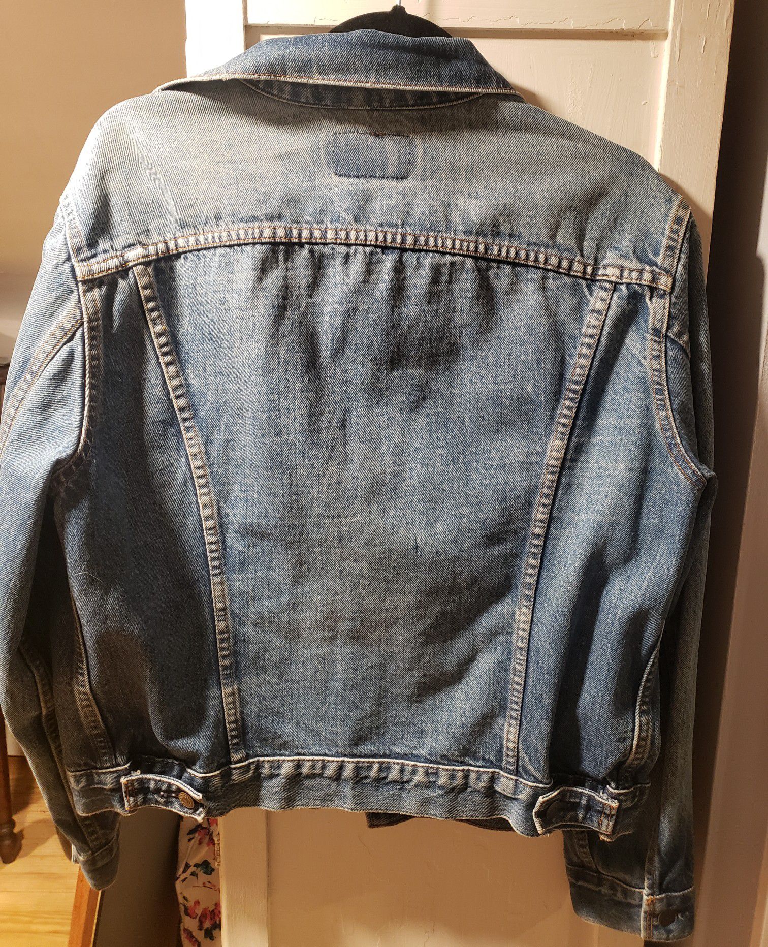 Vintage Levi Jean Jacket size 44, the jean is a bit less faded and more blue in person.