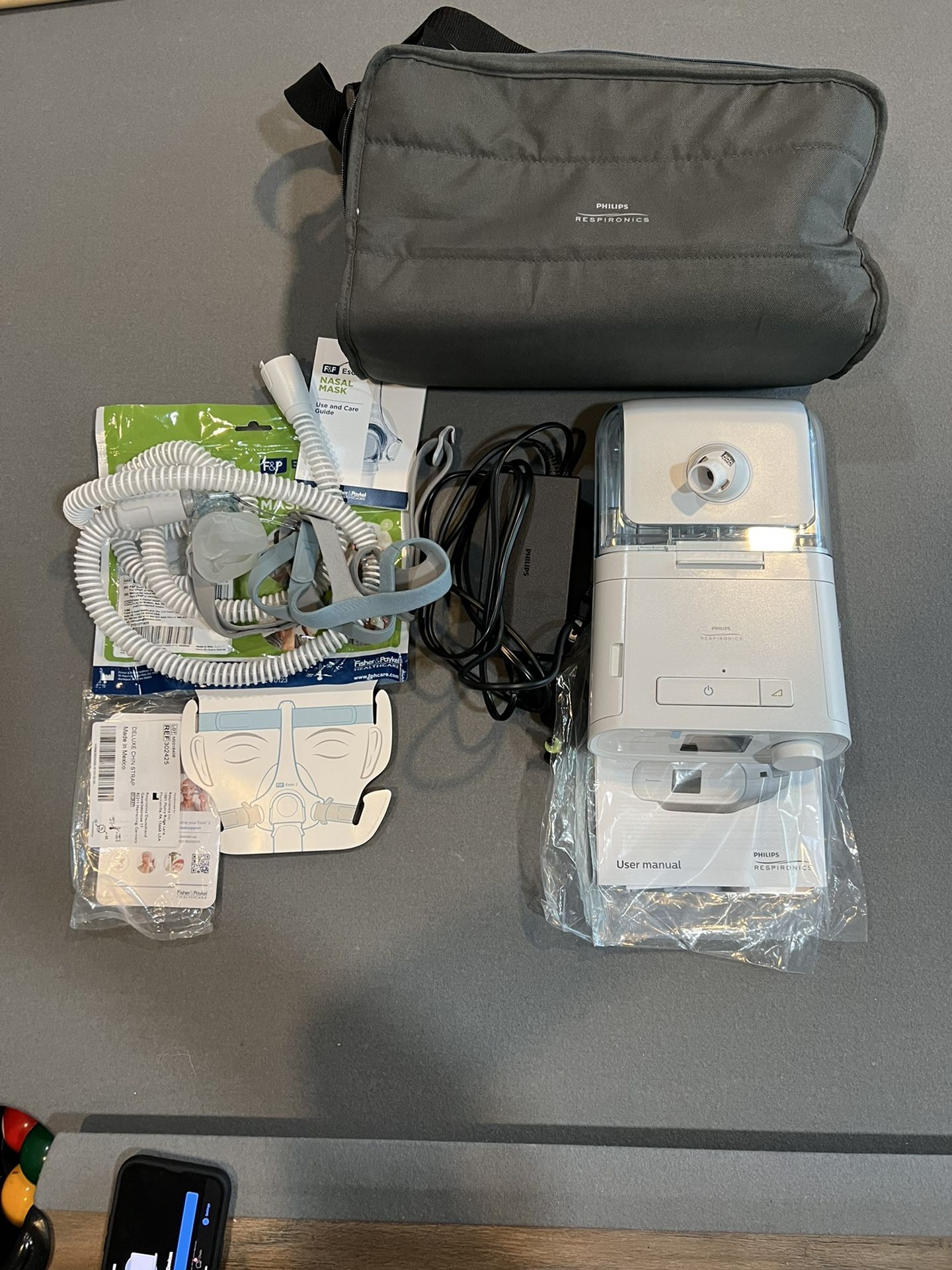 DreamStation Auto CPAP Machine with Humidifier + Fisher & Paykel Eson 2 Nasal CPAP Mask with Headgear - Fit Pack