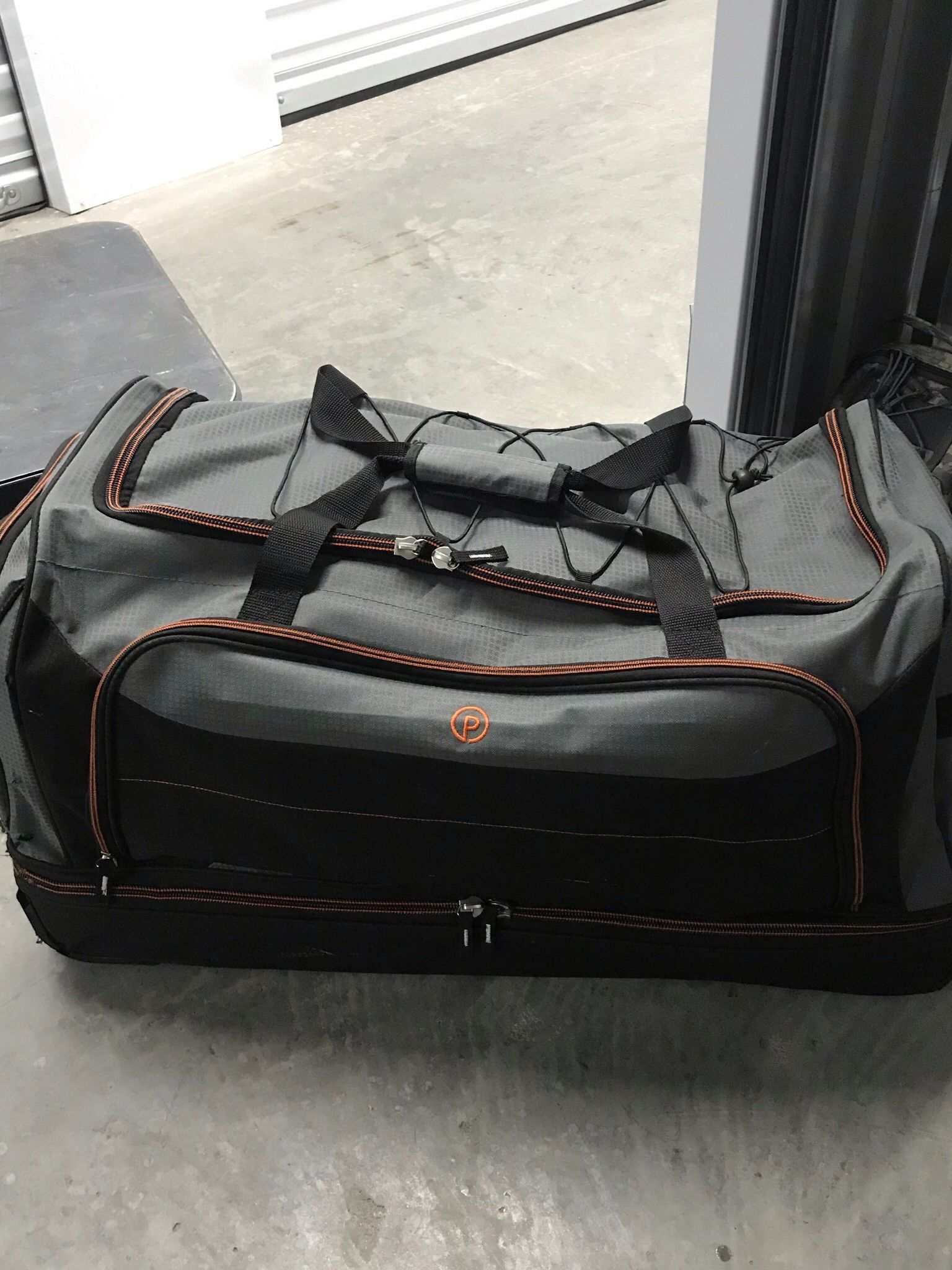 Pinnacle Rolling Duffle Bag Only Used To Store Things