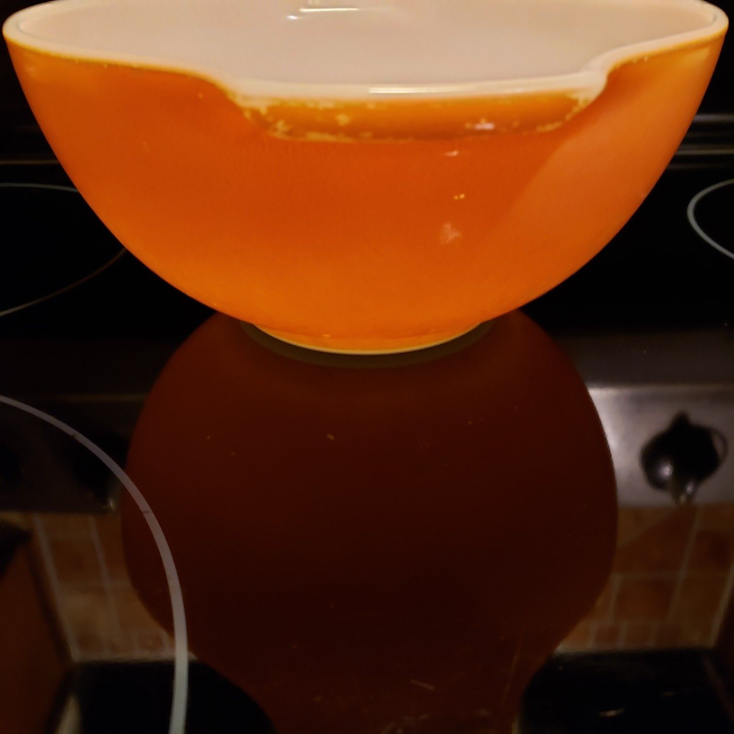 Pyrex small orange bowl..