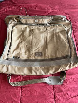 Garment Bag And Suitcase  Thumbnail
