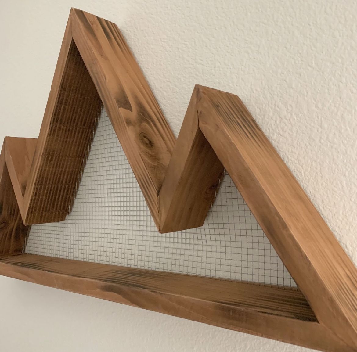 Wooden wall mounted mountain shelf