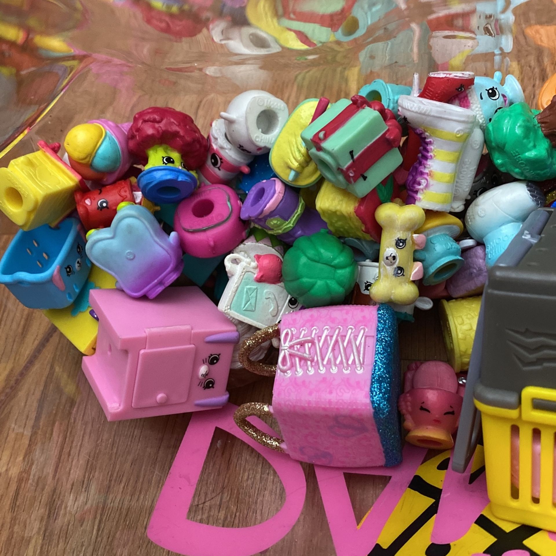 Selling Shop Kins, Lol Dolls With A Lot Of Clothing And It Comes In A Cute Bag
