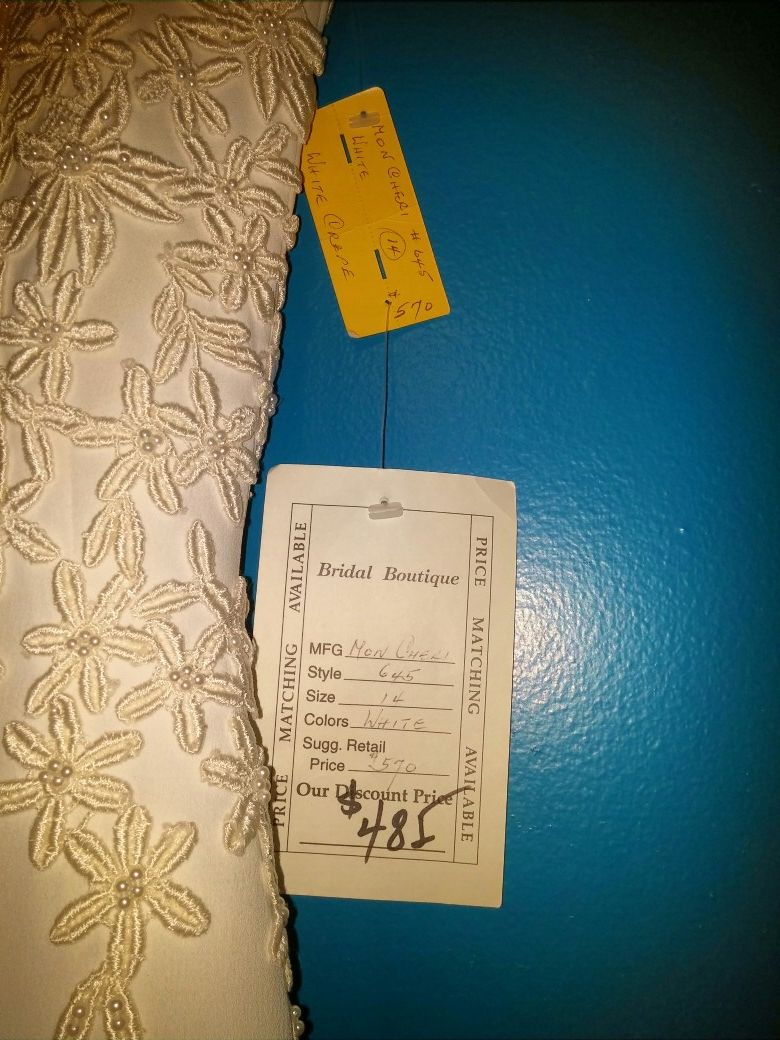 I have a Mon Cheri size 4 wedding dress