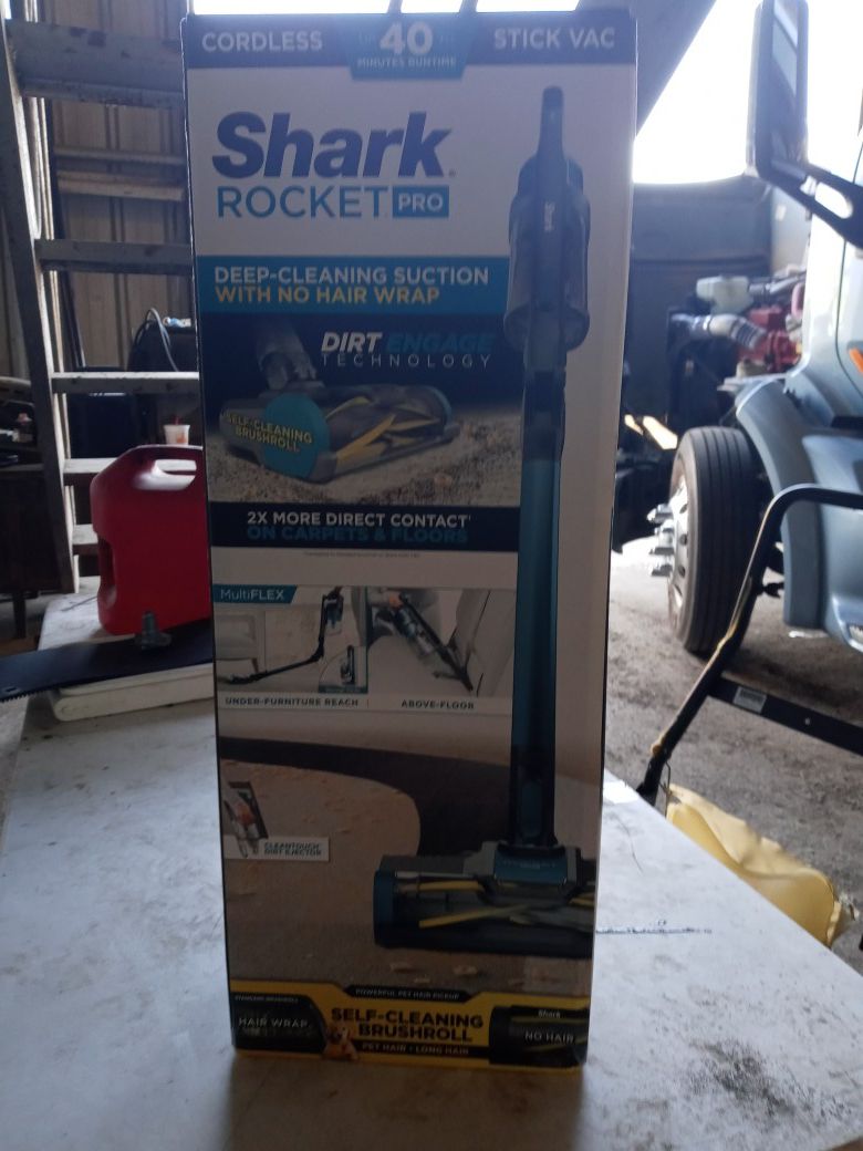 Shark rocket vacuum and carpet or hardwood floor cleaner.cordless